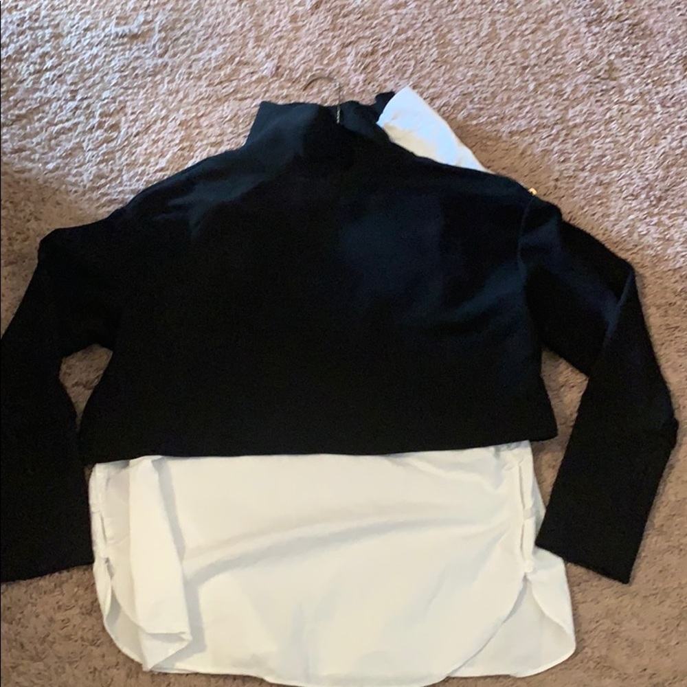 Black top with white underlay